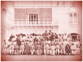 Photograph of guests at the wedding of Col. H.H. Sawai Maharaja Shri Sir Jai Singhji Bahadur of Alwar (seated in the centre), c. 1919.