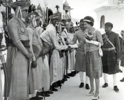 Photographed at Shiv Niwas Palace, Udaipur, India, in 1961, H.H. Maharana Bhagwat Singh of Udaipur is seen introducing his Rajput Nobility to H.M. Queen Elizabeth II on her arrival in his city of Udaipur