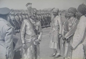His Highness Maharaja Dr Karni Singhji Maharaja of Bikaner at the time of his wedding inspecting the troops in Dungarpur.