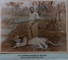 HH Darbar Shri Rawat Kanthad Wala with man-eater lion shot in 1931
