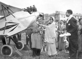 Maharani of Cooch Behar Indiraraje doing a ritual for the inauguration of a solo flight in 1929
