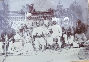 Rajeshree Rawle Parwat Singh, sitting in center