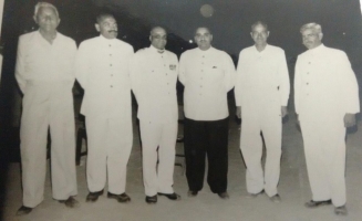 Maharaja Dr. Karni Singhji of Bikaner attending state banquet alongwith Thakur Bhairon Singhji of Hardesar and other State officials