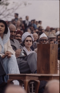 Queen Elizabeth II is pictured with Indian President Dr. Rajendra Prasad and Rajmata Gayatri Devi of Jaipur while watching a Polo match (NEW DELHI, INDIA - FEBRUARY, 1961)