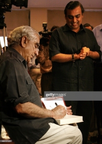 Former foreign minister Maj. Jaswant Singhji Jasol signing an autograph on his new book 'A Call of Honour' for Mukesh Ambani prior to the panel discussion on his book at Hilton Tower on Saturday. (Jasol)