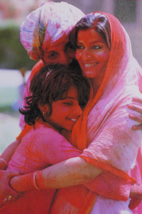 Gaj Singh II, the Maharaja of Jodhpur, the Maharani Hemlata Rajye, and the Maharajkumari Shivranjani Rajye hug each other after playing Holi