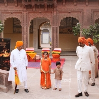 H.H Maharaja Gaj Singhji with his granddaughter Vaara Rajye and grandson Sirajdev Singh watching Raj Gangaur's Savari at Mehrangarh Fort