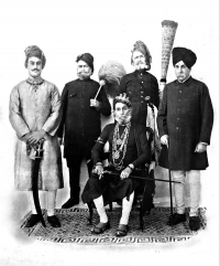 Shri Yadukul Chandra Bhal His Highness Maharaja Bhom Pal ji Deo Bahadur and his son Yuvraj Ganesh Pal Deo Bahadur of Karauli with Diwan Sahab Pandit Shankar Nath Sharma, extreme right (Karauli)