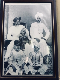 Thakur Khuman Singh of Kelawa with Thakur Jai Singh of Osian and on the floor Thakur Ranchor Singh of Kelawa and Tikam Singh, sons of Thakur Khuman Singh