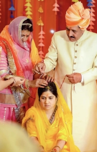 Raj Shri Thakur Sahab Upendra Singh ji with Thakurani Rajendra Kumari during jhol dastoor in the wedding of Baisa Raj Bhavya Kumari