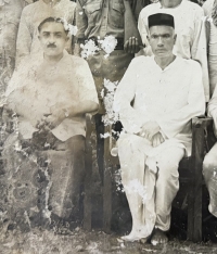 HH Sawai Mahendra Maharaja Devendra Singh Ju Dev with his Muktyaam Pt. Harprasad Daroga (Vyas)
