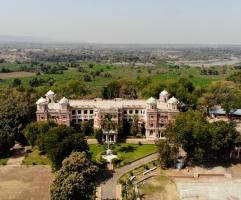 Sommerville European Guest House built by Maharaja Vijaysinhji, with the River Karjan and the Satpura hills in the background.