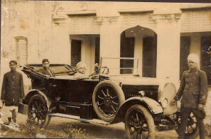 Raja Laliteshwar Prasad Singhji in his car with attendents