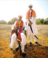His Highness Maharajadhiraja Suryavanshi Kshatriya Kul Bhushan Hindua Suraj Hindupati Ekling Deewan Shri Huzur Maharana Vishvaraj Singh Bahadur with his son Yuvraj Maharajkumar Kunwar Devjaditya Singh