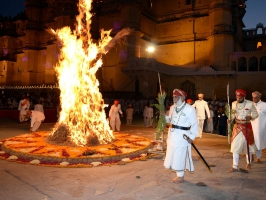 Shriji Arvind Singh Mewar and Lakshyaraj Singh Mewar circumambulating the Holika effigy