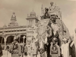 Kumar Shri Atmanya Dev Jhala of Wadhwan, mounted on a richly caparisoned elephant, arrives in Mysore for his wedding with Maharajkumari Shri Kamakshi Devi of Mysore